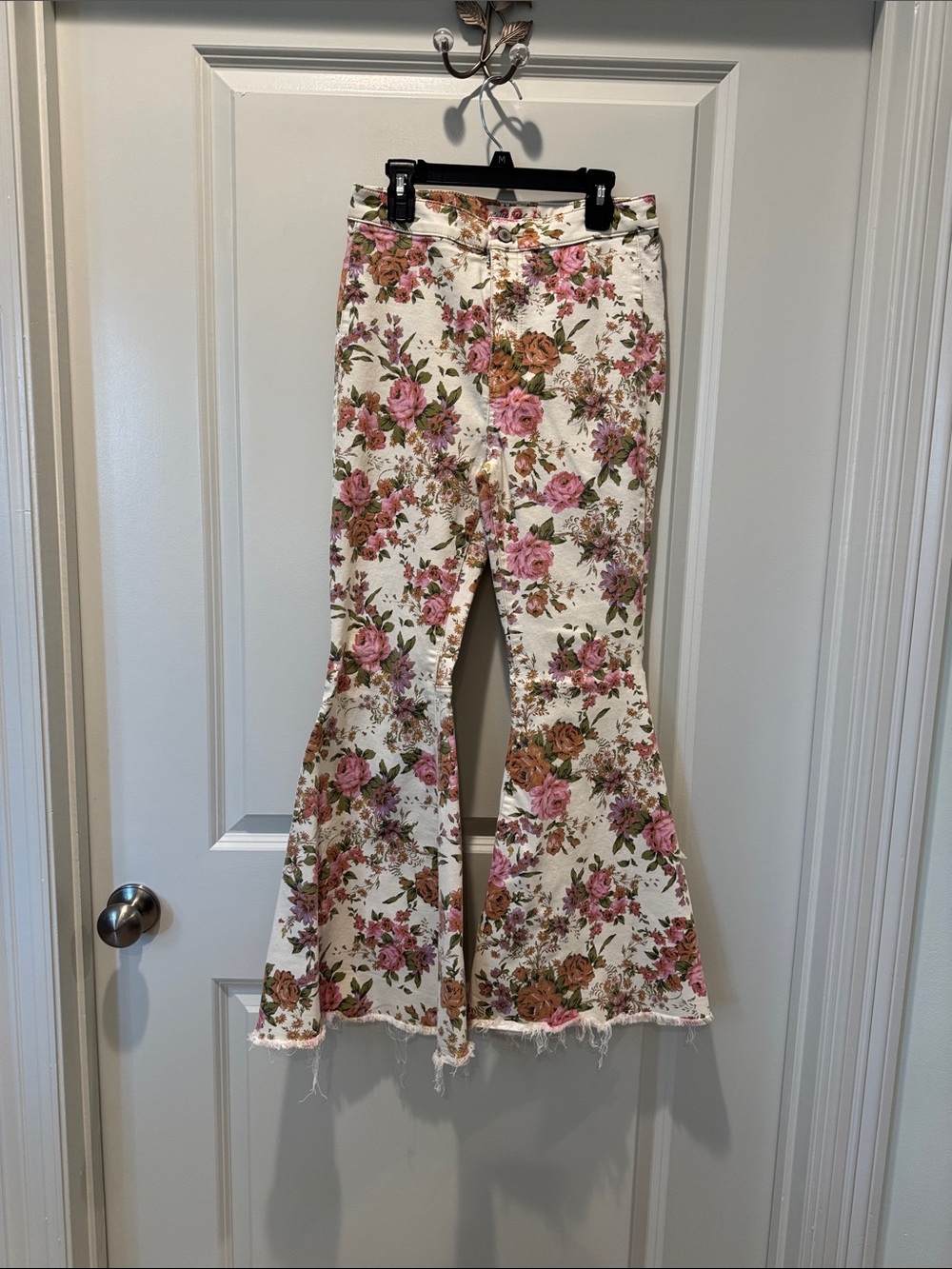 We The Free Floral Flare Jeans in Pink and Cream